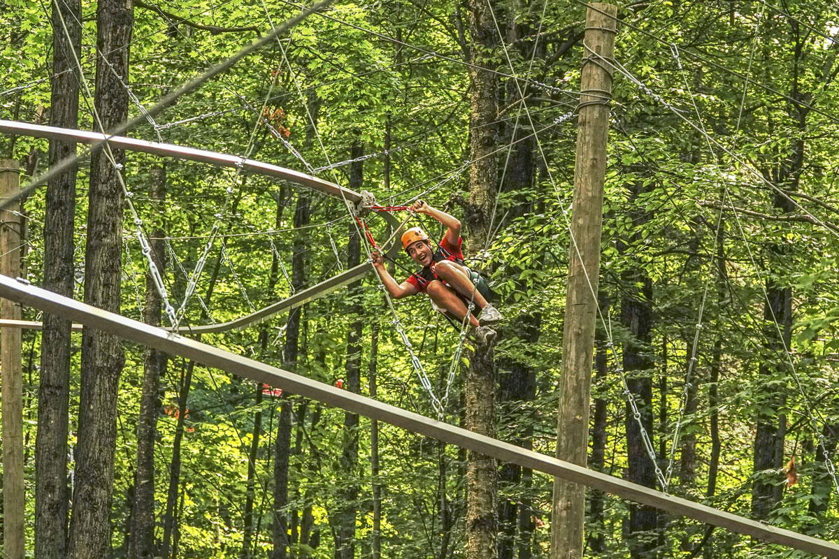 a poto of people on th zip line