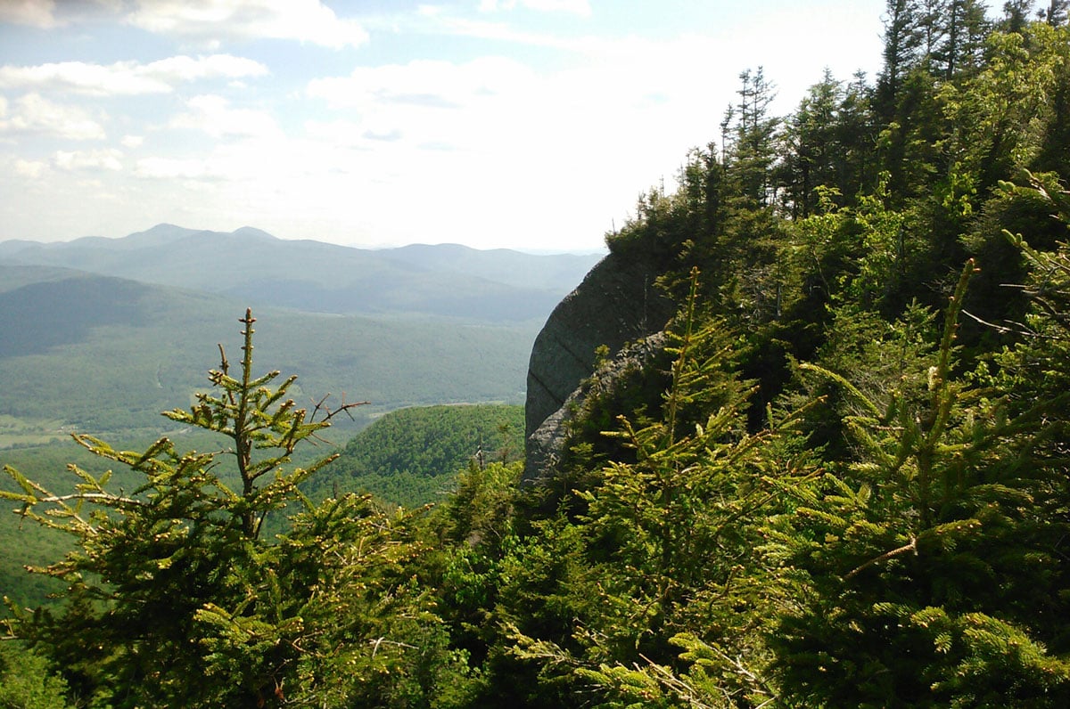 A photo of people hiking the mountain